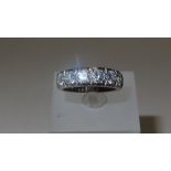 18ct white gold seven stone half hoop diamond ring, size N. 1.65 ct approx., total, 6.6 g