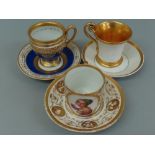 Three 19thC Continental porcelain coffee / chocolate cups and saucers