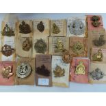 Twenty WWI / WWII Canadian Army regimental cap badges