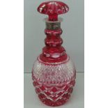 Cut glass decanter and stopper with ruby overlay and silver collar. By F. & Son Ltd, London c1959.