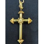 18ct gold cross with filigree work decoration on an 18ct gold rope twist chain (tested) - total