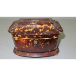 Victorian tortoiseshell sarcophagus shaped tea caddy with pewter stringing, two zinc lined