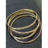 Four matching 9ct gold bangles with English hall marks - 24.2 g