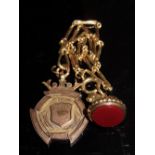 9ct gold twisted wire watch chain, medallion and lion and cornelian fob, all marked 9ct - total