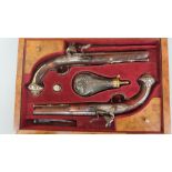 An impressive pair of late 18thC 16 bore flintlock holster pistols made for the Eastern market. 16