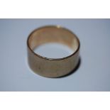 9ct. gold wide wedding ring - 3.8 g