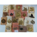 Twenty WWI / WWII Canadian Army regimental cap badges