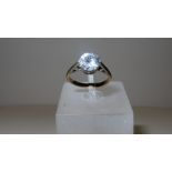 White stone solitaire ring, size K / L with gold shank