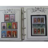 1953 - 1978 Coronation Anniversary, two albums of mint stamps, books, sheets, etc., from around