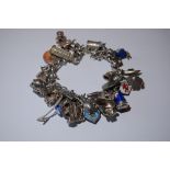 Silver charm bracelet - 73 g.