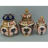 Three Royal Crown Derby urns / pot pourri pots with Old Imari decoration, tallest 14.5 cm, pattern