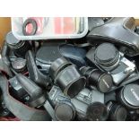 Box of digital camera equipment together with SLR camera and lenses, Cokin filters