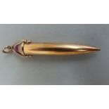 Edwardian 9ct gold telescopic propelling pencil with red cabochon stone to top held in a bullet