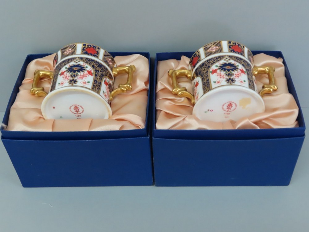 A pair of Royal Crown Derby two handled cans with Old Imari decoration, ht 7.75 cm, pattern no. - Image 3 of 3