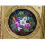 Impressive circular porcelain plaque in the Derby style with decoration of flowers with gilt