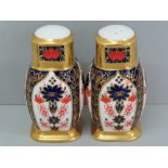 Royal Crown Derby salt and pepper pots with Old Imari decoration, ht. 10 cm, pattern no. 1128, in