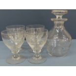 Late Victorian decanter and four matching glasses engraved with decoration of cock fighting scenes