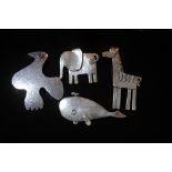 Four silver brooches - bird, whale, elephant and llama