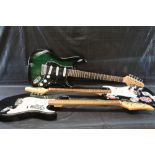 Three Stratocaster style guitars including Encore