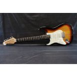 Westwood left handed stratocaster style guitar, three single coil pickups, five way switch, whammy