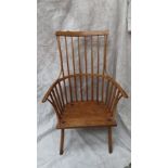 19thC ash comb back Windsor chair with shaped top rail, wrap around arms solid seat on turned