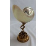 Nautilus shell mother of pearl lining with silver gilt stand having decoration of Neptune, and
