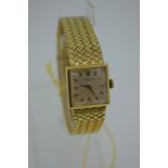18ct gold International Watch Co. ladies' winding wrist watch with integral basket weave strap,