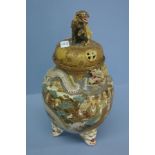 Satsuma pottery pot pourri urn with lion dog finial and decoration of dragon entwined around pot,