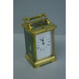 French Brass four glass repeater carriage clock striking on the half. Ht. 5 ins.