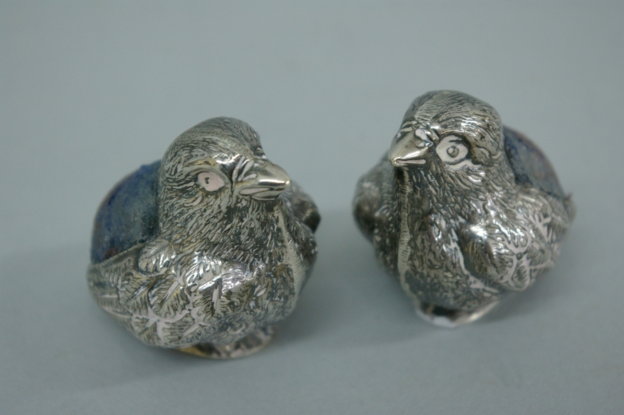 Pair of Edwardian silver pin cushions in the form of chicks. Sheffield 1905. Maker S. Mordan & Co.