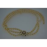 Triple string pearl necklace with gold and diamond clasp, in need of restringing - length 14.25