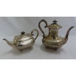 Edwardian silver half-fluted tea and coffee pots of ovoid form on ball feet, Sheffield 1901, 41 ozt,