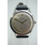 Movado gents' stainless steel automatic "bumper" wrist watch with silvered dial, gold hands and