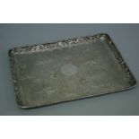 Good quality 19thC Chinese chased silver tray with decoration of bamboo edge, dragons in the