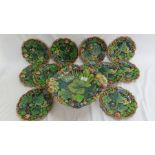 A 19thC Majolica part dessert service with decoration of flora, fauna and insects in multicoloured
