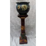 Late 19thC Majolica ornate plant pedestal with decoration of gadrooning, figures dancing, scales,