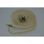 Triple string of graduated pearl necklace with 9ct gold pearl and turquoise bead clasp - length 14