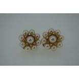 Pair of 9ct gold pearl and diamond cluster earclips. Maker T.J.