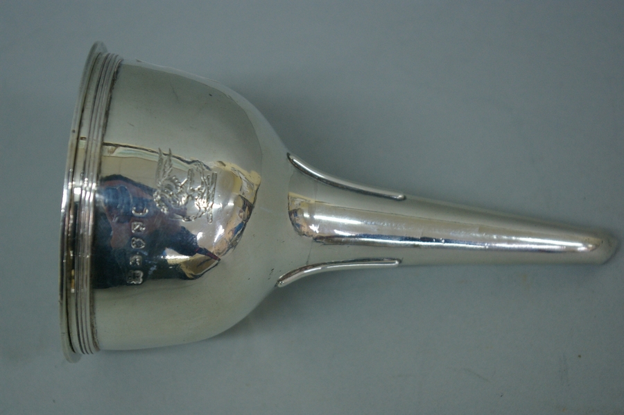 GIII silver wine funnel strainer with shell clasp and reeded border. London 1808. 4.5 ozt. Makers