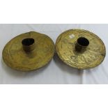 Pair of African brass disc shaped mounts for poles with hammered geometric design decoration. Diam