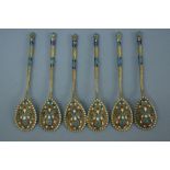Set of six Russian silver champleve teaspoons with bead and twisted decoration marked 84