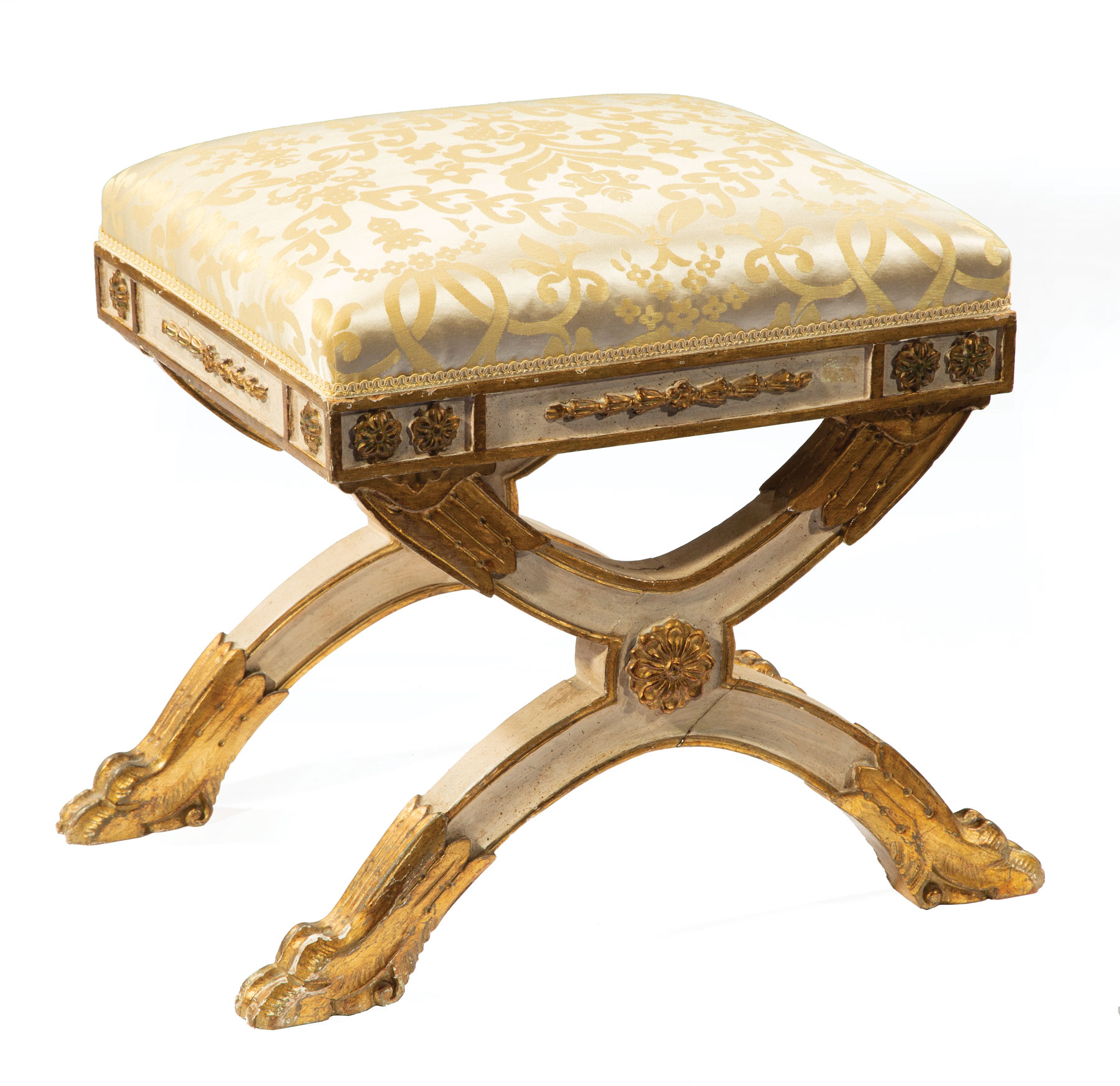 French Neoclassical Carved, Painted and Parcel Gilt Curule Bench , 19th c., floral-decorated frieze,