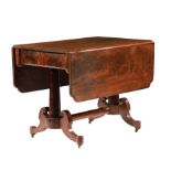American Classical Carved Mahogany Sofa Table , early 19th c., shaped drop-leaf top, turreted