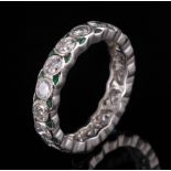 Platinum, Emerald and Diamond Eternity Ring , comprised of 17 bezel set round brilliant cut