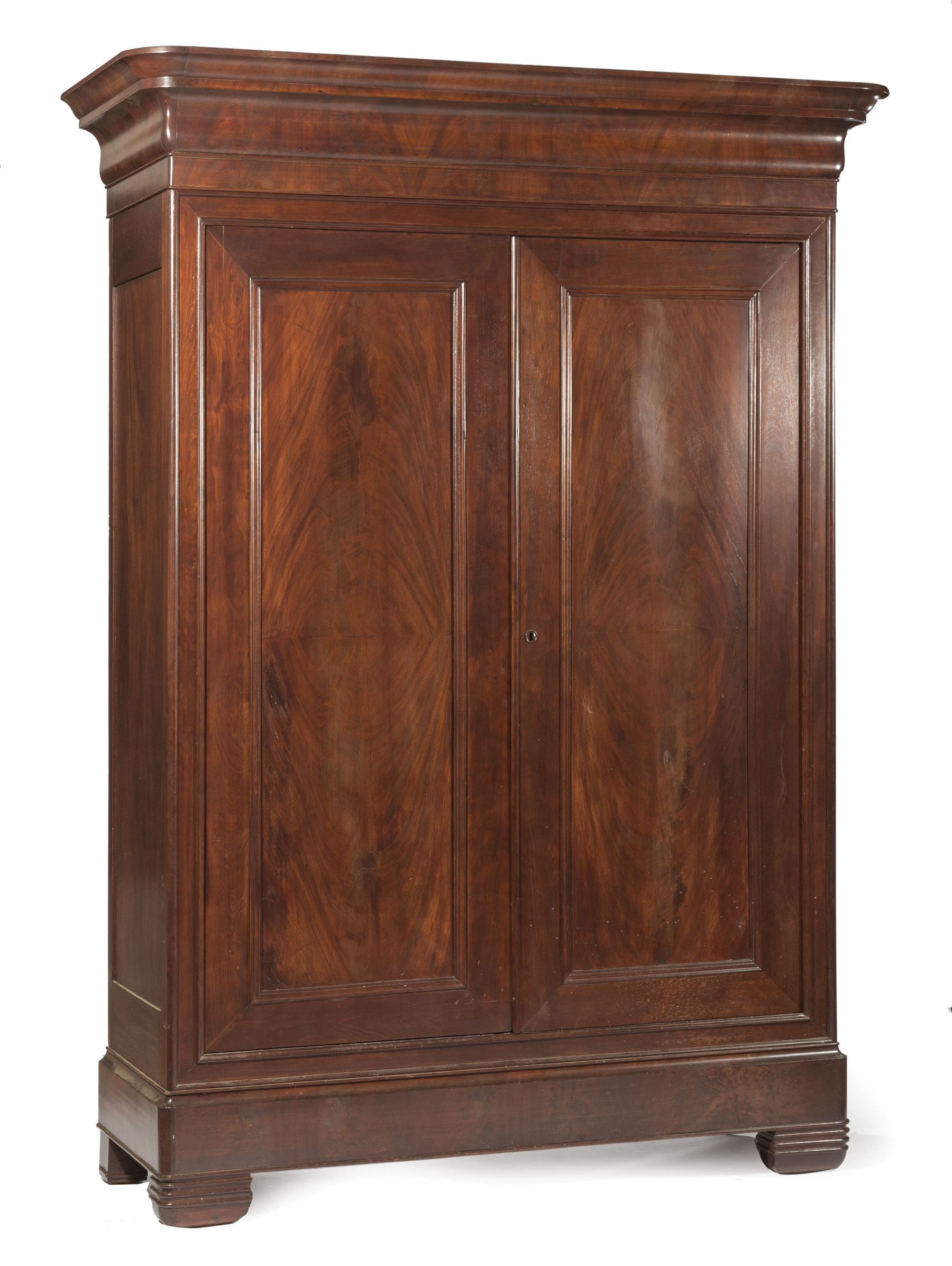 Louisiana Figured Mahogany Armoire , mid-19th c., stepped ogee cornice, molded bookmatched door