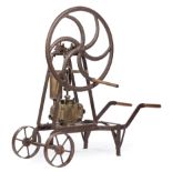 American Cast Iron and Brass Hand-Operated Pump , large crank wheel activates piston pump, spoked