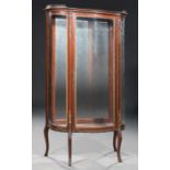 Louis XVI-Style Bronze-Mounted Vitrine , galleried top, caryatid mounts, serpentine case, cabriole