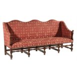 William and Mary-Style Carved Walnut Sofa , 19th c., triple arched back, downswept arms, turned
