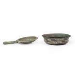 Two Ancient Roman Bronze Vessels , one with lion term handle, larger h. 1 1/2 in., dia. 6 in
