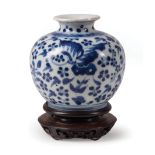 Chinese Blue and White Porcelain Vase , 18th c. decorated with butterflies amid flowering and